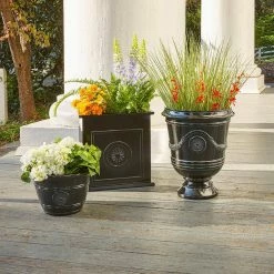 Southern Patio Porter Large 15.50 in. x 18 in. Black Resin Composite Urn Planter -Achla Designs Shop black southern patio urn planters cmx 042464 c3 1000