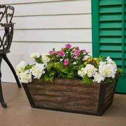 Southern Patio Farmhill 24 in. x 9 in. Brown High-Density Resin Deck Box Planter -Achla Designs Shop brown southern patio plant pots hdr 049517 e1 1000