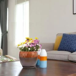 Southern Patio Kendall 7.87 in. x 7.09 in. Copper Ceramic Indoor Egg Planter (2-Pack) 27 Southern Patio Kendall 7.87 in. x 7.09 in. Copper Ceramic Indoor Egg Planter (2-Pack) -Achla Designs Shop copper southern patio plant pots crm 031123p2 d4 1000