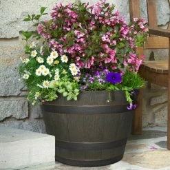 Southern Patio 22.44 in. Dia x 14.96 in. H Rustic Oak High-Density Resin Whiskey Barrel Planter 19 Southern Patio 22.44 in. Dia x 14.96 in. H Rustic Oak High-Density Resin Whiskey Barrel Planter -Achla Designs Shop dark brown southern patio barrel planters hdr 023395 44 1000