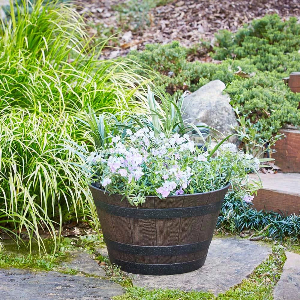 Southern Patio 22.5 in. Dia x 15 in. H Dark Brown High-Density Resin Whiskey Barrel Planter with Wheels 4 Southern Patio 22.5 in. Dia x 15 in. H Dark Brown High-Density Resin Whiskey Barrel Planter with Wheels - Image 2