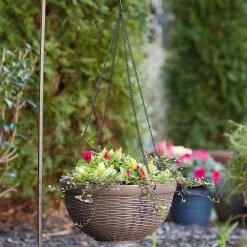 Southern Patio Jamaica Wicker 12.5 in. Dark Coffee High-Density Resin Hanging Basket Planter 17 Southern Patio Jamaica Wicker 12.5 in. Dark Coffee High-Density Resin Hanging Basket Planter -Achla Designs Shop dark coffee southern patio hanging planters hdr 054788 1d 1000