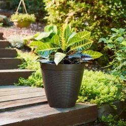 Southern Patio Jamaica Wicker Large 15 in. x 14 in. Dark Coffee High-Density Resin Planter -Achla Designs Shop dark coffee southern patio plant pots hdr 054764 1d 1000