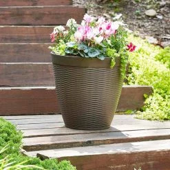 Southern Patio Jamaica Wicker Large 15 in. x 14 in. Dark Coffee High-Density Resin Planter -Achla Designs Shop dark coffee southern patio plant pots hdr 054764 77 1000
