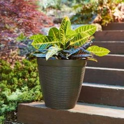 Southern Patio Jamaica Wicker Large 15 in. x 14 in. Dark Coffee High-Density Resin Planter -Achla Designs Shop dark coffee southern patio plant pots hdr 054764 a0 1000