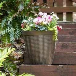 Southern Patio Jamaica Wicker Large 15 in. x 14 in. Dark Coffee High-Density Resin Planter -Achla Designs Shop dark coffee southern patio plant pots hdr 054764 d4 1000