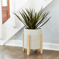 Southern Patio Cylinder 8.8 in. x 9.75 in. Gray Concrete Tall Indoor Planter with Stand -Achla Designs Shop gray southern patio plant pots grc 081630 1d 1000