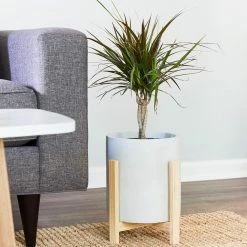 Southern Patio Cylinder 8.8 in. x 9.75 in. Gray Concrete Tall Indoor Planter with Stand -Achla Designs Shop gray southern patio plant pots grc 081630 77 1000