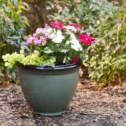 Southern Patio Heritage Large 18 in. x 14.4 in. Green High-Density Resin Planter 15 Southern Patio Heritage Large 18 in. x 14.4 in. Green High-Density Resin Planter -Achla Designs Shop green southern patio plant pots hdr 077046a 77 1000