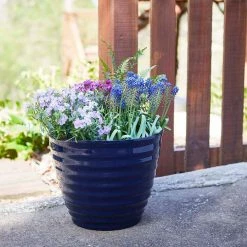 Southern Patio Beehive 14 in. x 11.5 in. Navy Resin Planter with Saucer -Achla Designs Shop navy southern patio plant pots hdr 064756 1d 1000