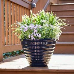 Southern Patio Beehive Large 16 in. x 12.3 in. Navy High Density Resin Planter with Saucer -Achla Designs Shop navy southern patio plant pots hdr 064770 77 1000