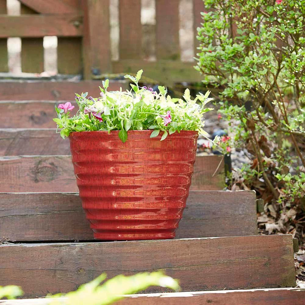 Southern Patio Beehive 14 in. x 11.5 in. Red Resin Planter with Saucer 8 Southern Patio Beehive 14 in. x 11.5 in. Red Resin Planter with Saucer - Image 6