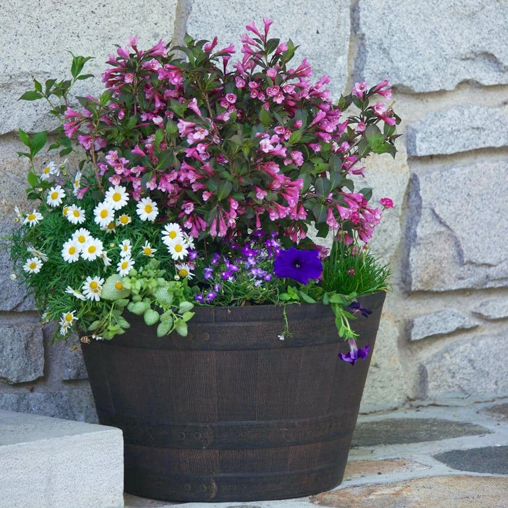 Southern Patio 25 in. Dia x 14.57 in. H Rustic Oak High-Density Resin Whiskey Barrel Planter 9 Southern Patio 25 in. Dia x 14.57 in. H Rustic Oak High-Density Resin Whiskey Barrel Planter - Image 7