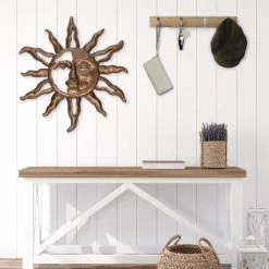 Southern Patio 22.5 in. H Sunface Metal Wall Outdoor Decor -Achla Designs Shop southern patio outdoor wall sculptures wdc 054610 44 1000