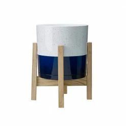 Southern Patio Henrietta 7.8 in. x 7.8 in. White and Blue High-Density Resin Indoor Planter With Wood Stand 12 Southern Patio Henrietta 7.8 in. x 7.8 in. White and Blue High-Density Resin Indoor Planter With Wood Stand -Achla Designs Shop white and blue southern patio plant pots hdr 077060a 40 1000